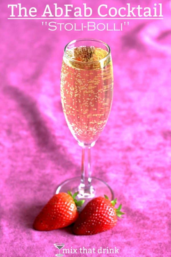 AbFab cocktail in champagne flute with strawberries