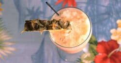 Overhead view of Amaretto Colada with pineapple slice