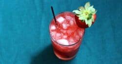 Bahama Mama drink with strawberry on rim