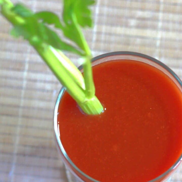 Overhead view of Bloody Mary drink with celery