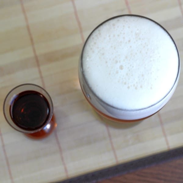 Overhead view of glass of beer and shot of whiskey