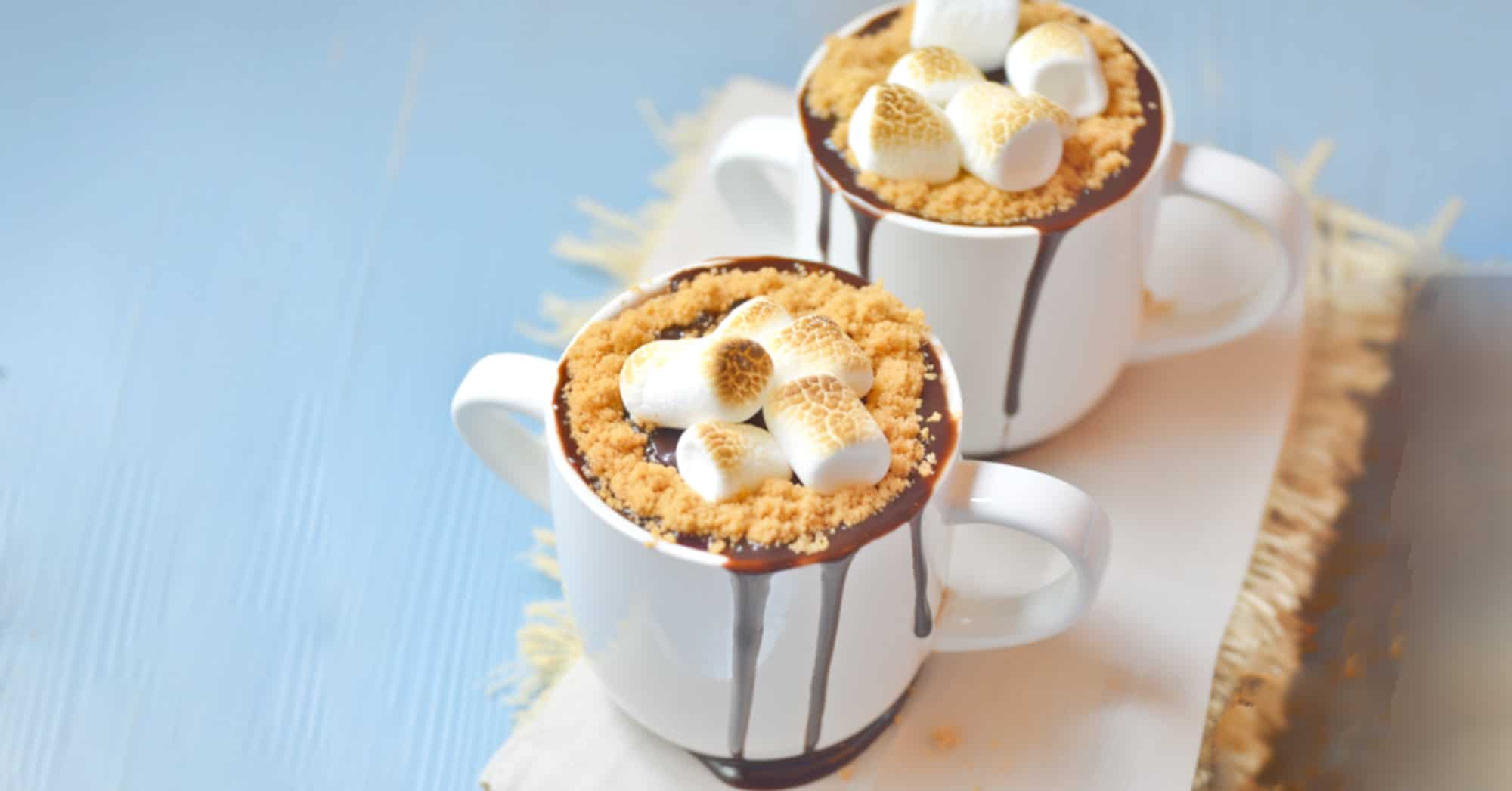 Boozy S’mores Hot Cocoa drink with marshmallows and graham cracker