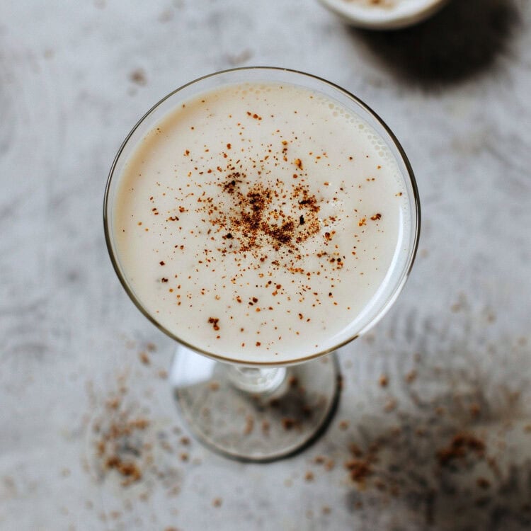 Overhead view of Brandy Alexander cocktail with nutmeg sprinkled on top