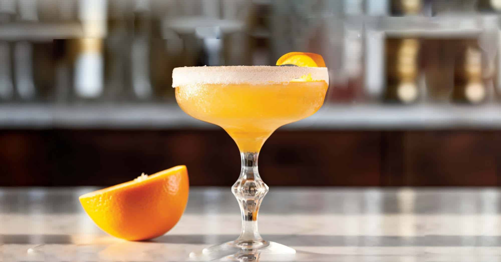 Brandy Crusta cocktail in coupe with orange twist