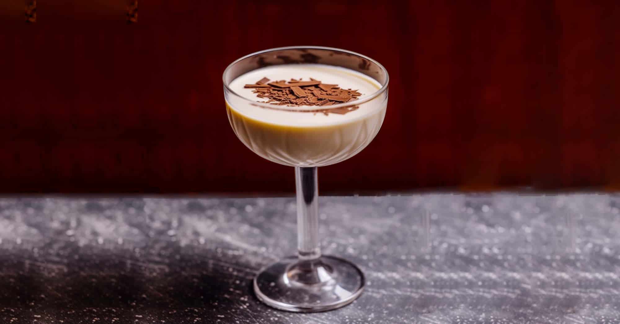 Bushwacker cocktail in glass with chocolate shavings