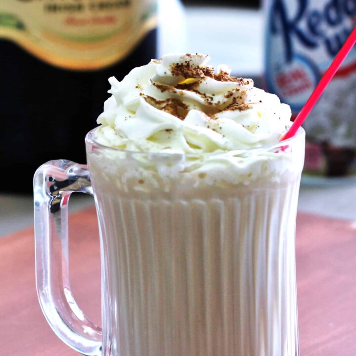 Butterscotch Coffee Cocktail with whipped cream and nutmeg sprinkles