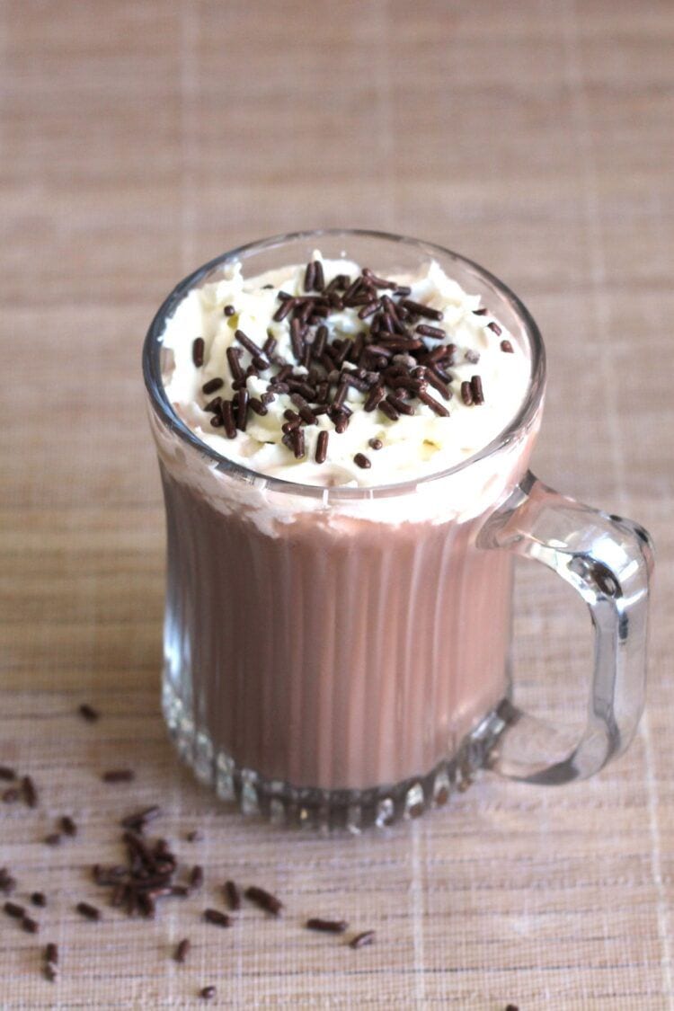 Cafe Nelson drink with whipped cream and chocolate sprinkles