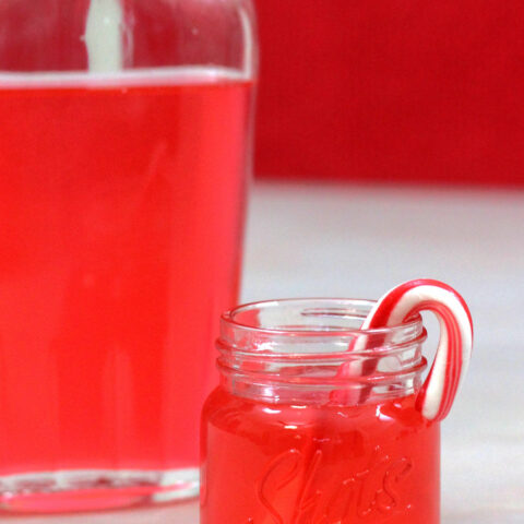 Candy Cane Vodka infusion in flask and shot glass