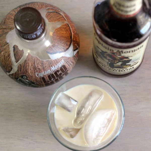 Overhead shot of Captain & Loco cocktail and two liquor bottles