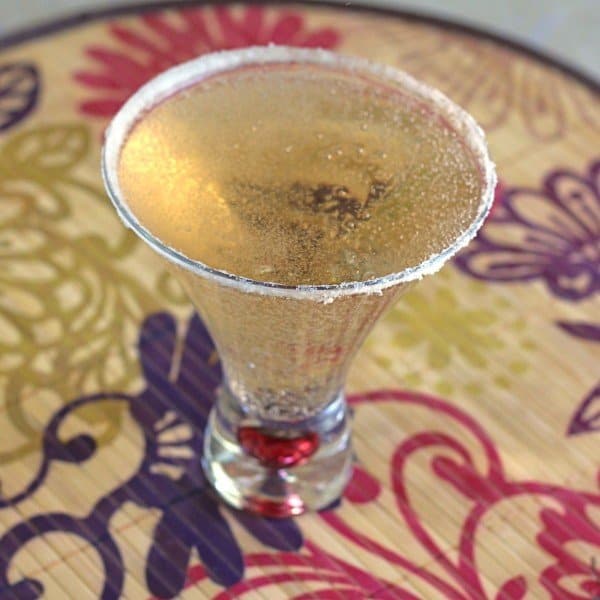 Tilted angle view of Caribou Martini drink with sugar rim