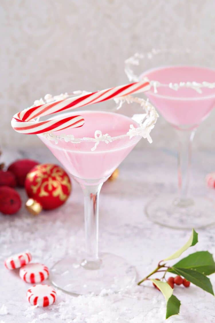 Christmas cocktails garnished with candy canes