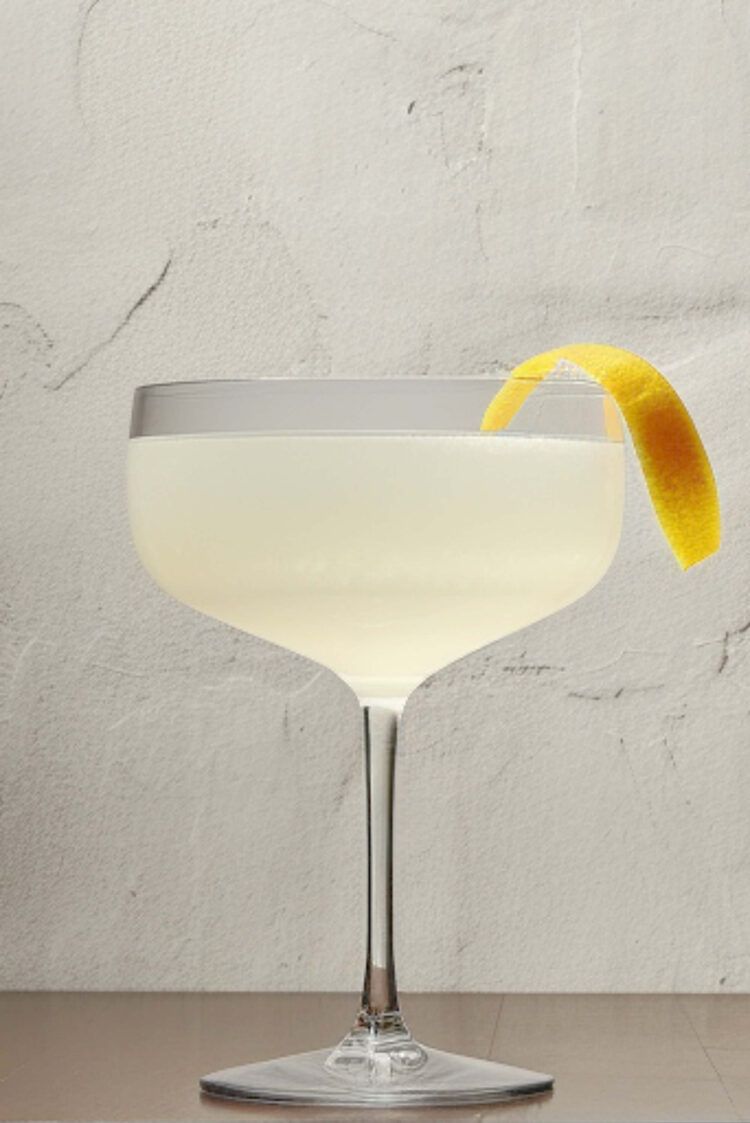 Corpse Reviver No. 2 cocktail in coupe glass with orange twist