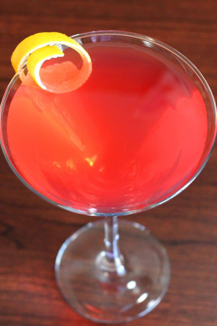 Overhead view of Cosmopolitan cocktail with lemon twist