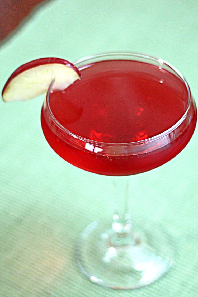 Closeup view of Felicia cocktail with apple slice