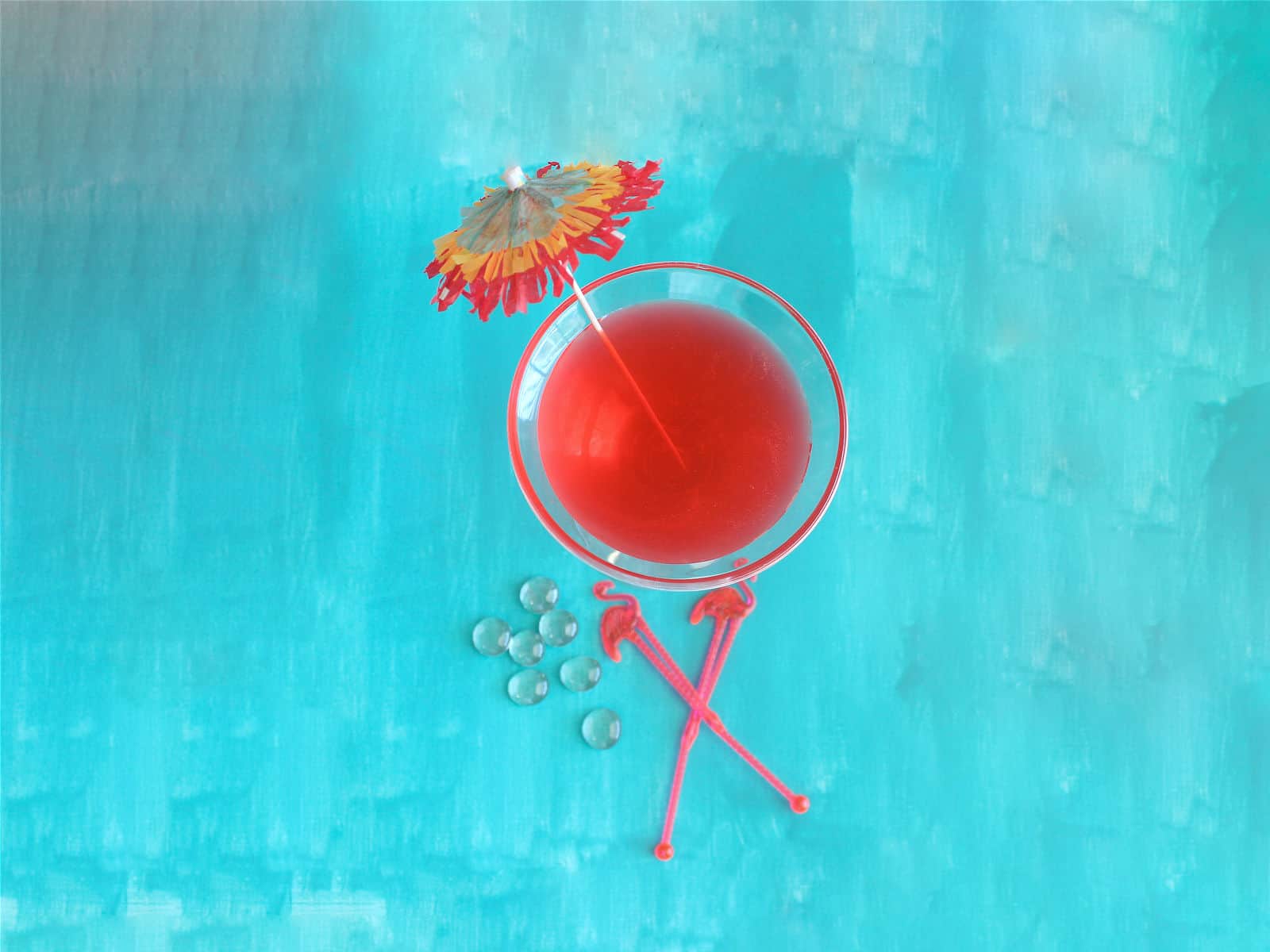 Overhead view of Flamingo Cocktail drink with cocktail umbrella