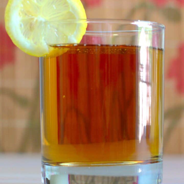 Grand Apple drink with lemon wheel