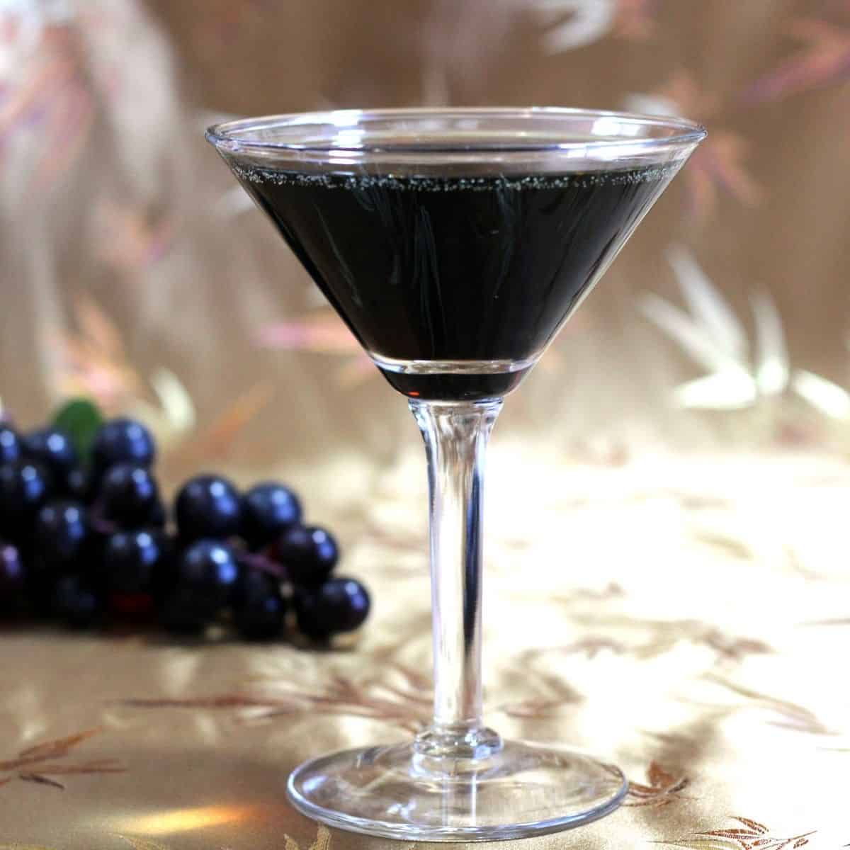 Grape Russian Tea drink in cocktail glass