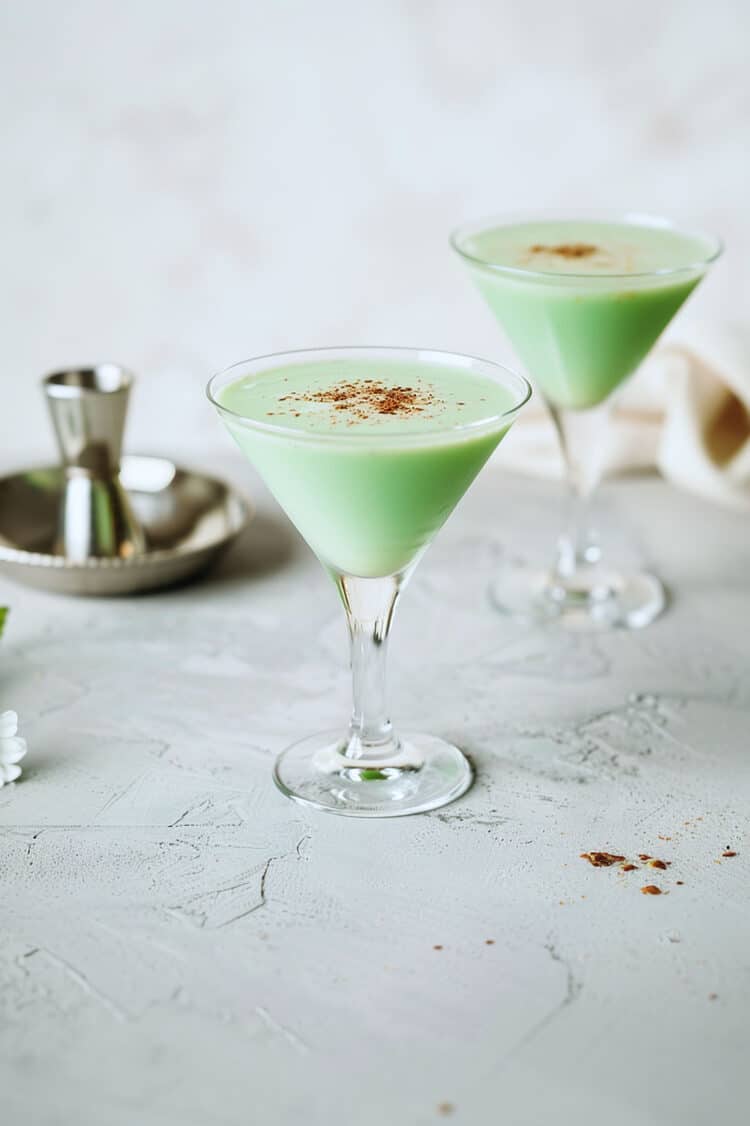 Closeup of creamy green Grasshopper drink with mint sprig