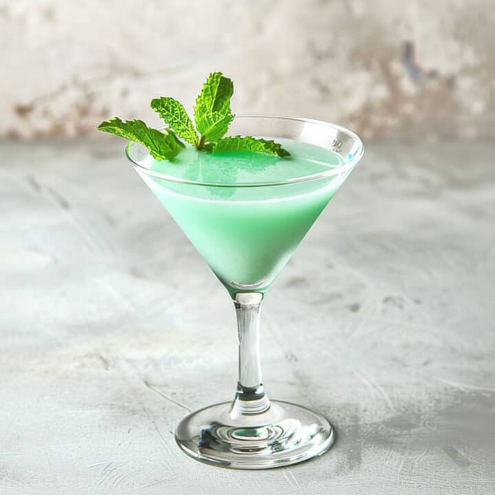 Creamy green Grasshopper drink with mint sprig