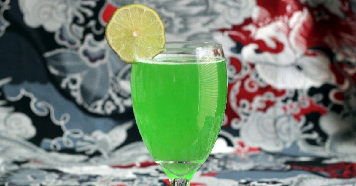 Green Demon drink with lime slice