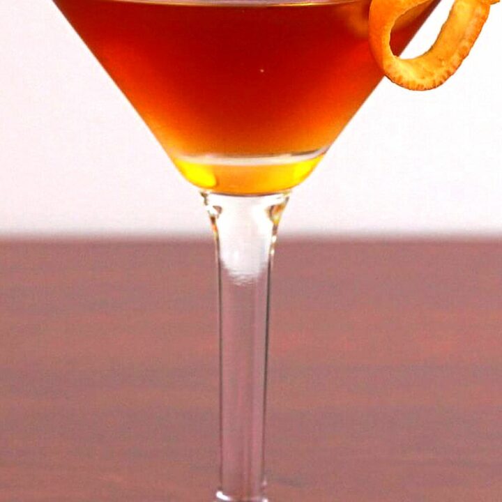 Hanky Panky Cocktail on table with orange twist