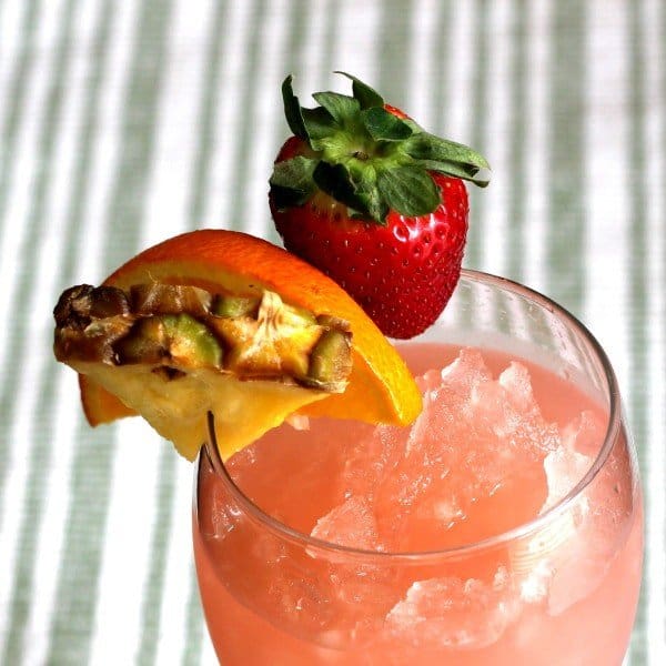 Overhead view of Hatian Gold drink with fruit garnish