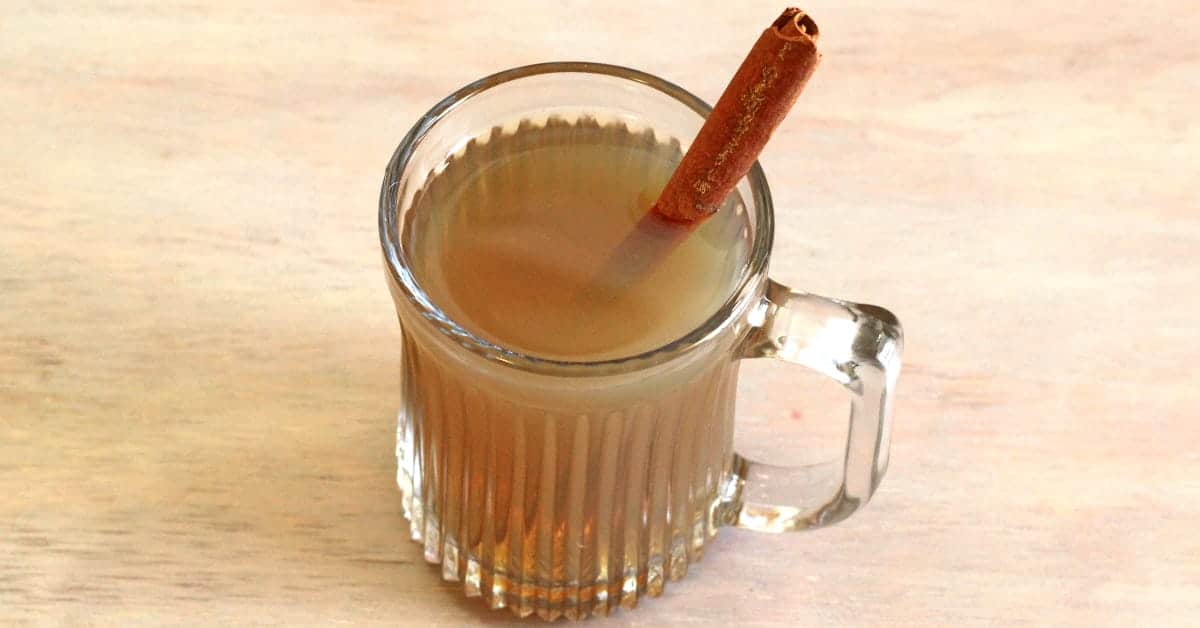 Hot Buttered Rum with cinnamon stick