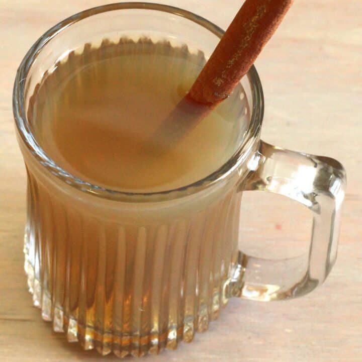 Overhead view of Hot Buttered Rum with cinnamon stick