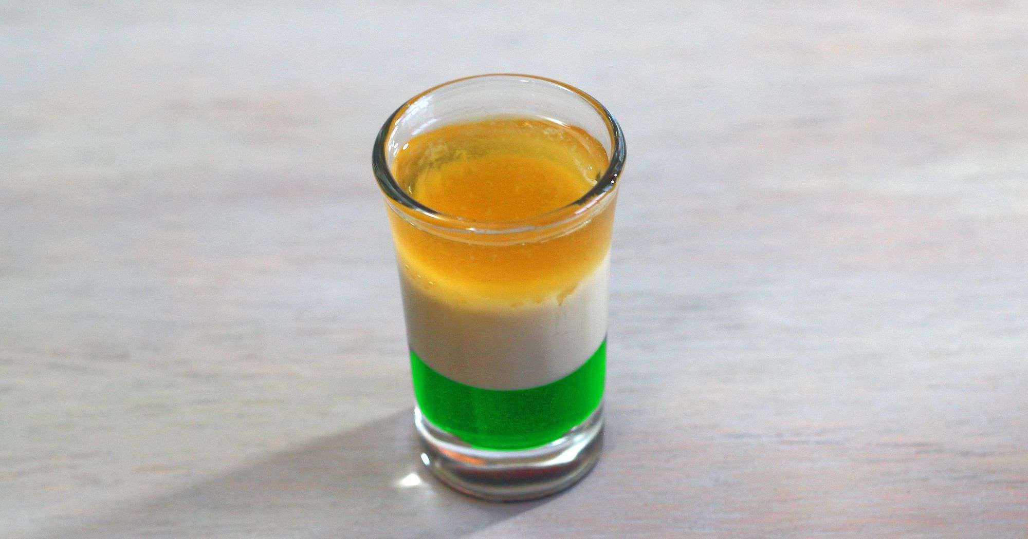 Irish Flag shot drink sitting on table