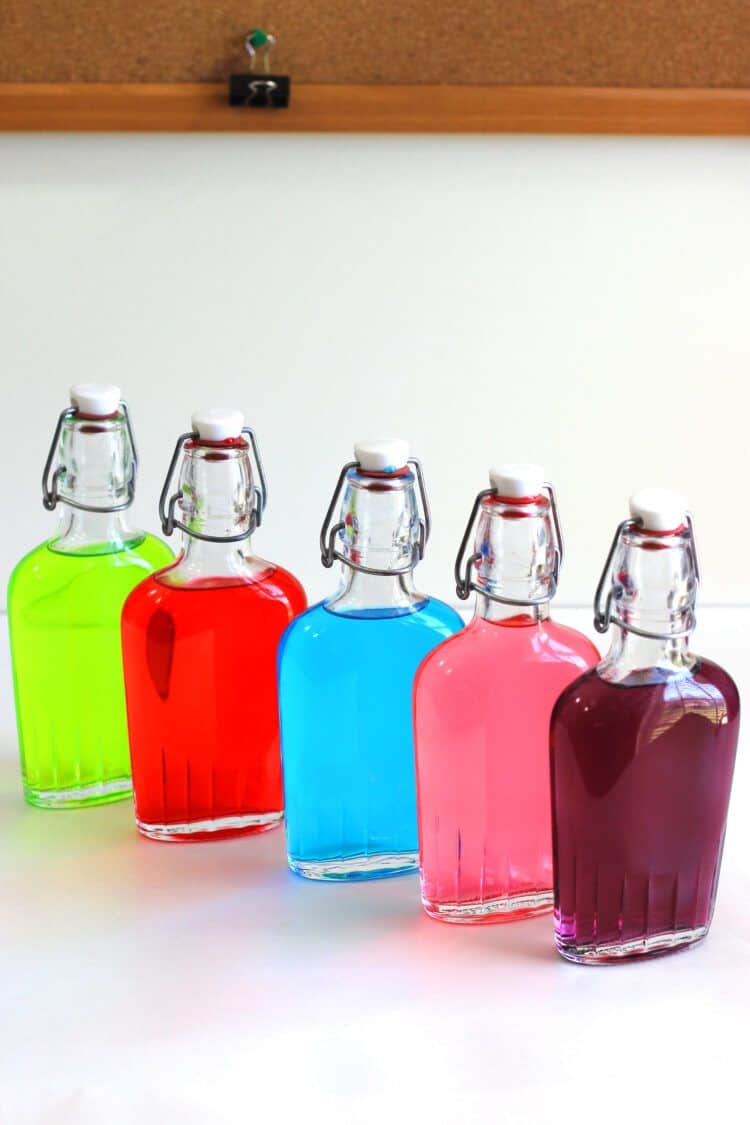 Finished Jolly Rancher Vodka infusions in flasks