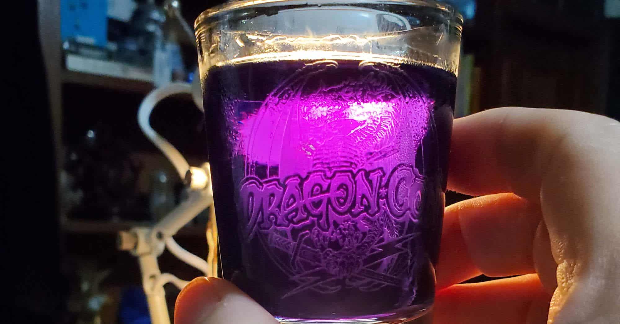 Mage's Cocktail looking purple when held in front of a lamp