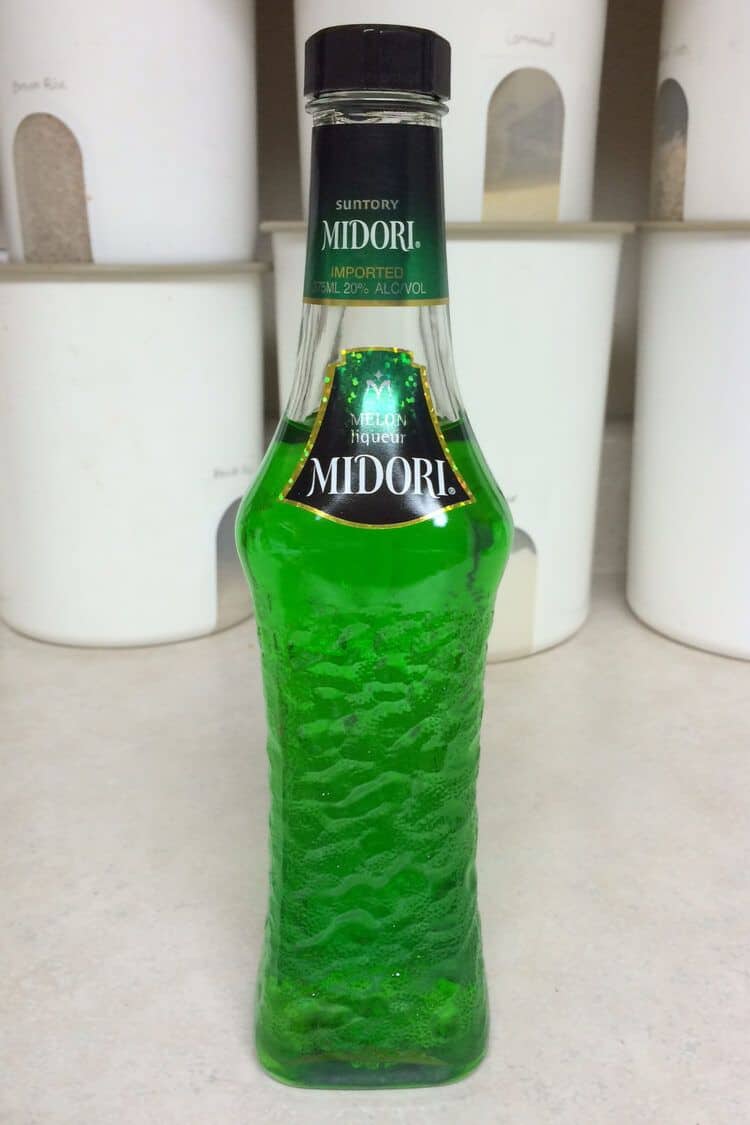 Bottle of Midori on countertop