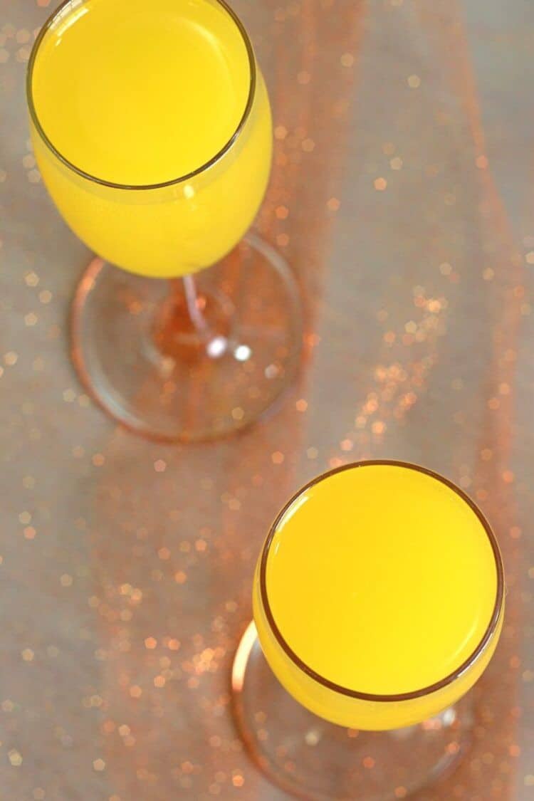 Overhead view of Mimosa cocktails on table