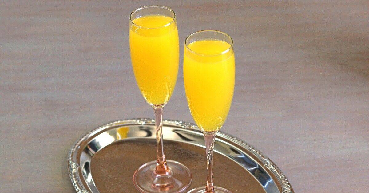 Two Mockmosa drinks on silver tray