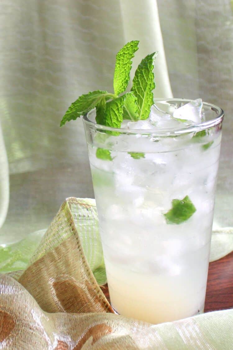 Mojitarita drink with lots of mint sprigs