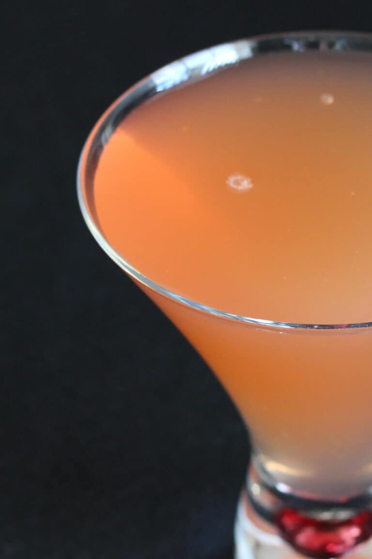 Overhead view of Peking Cocktail against dark background