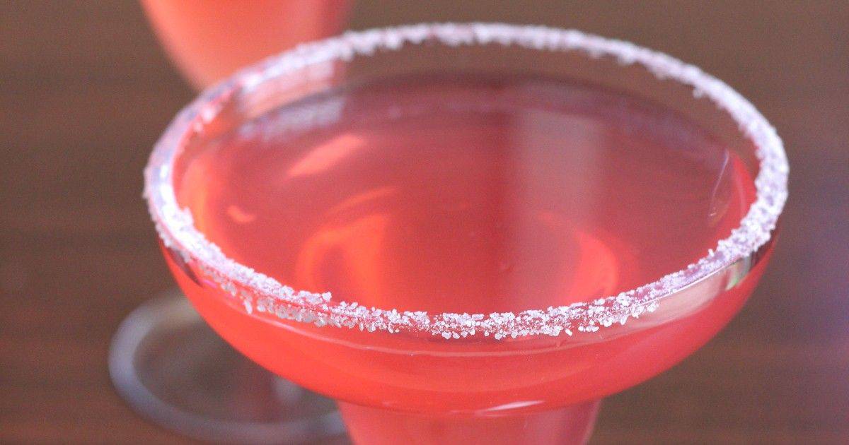 Pink Margarita drinks with salt rim