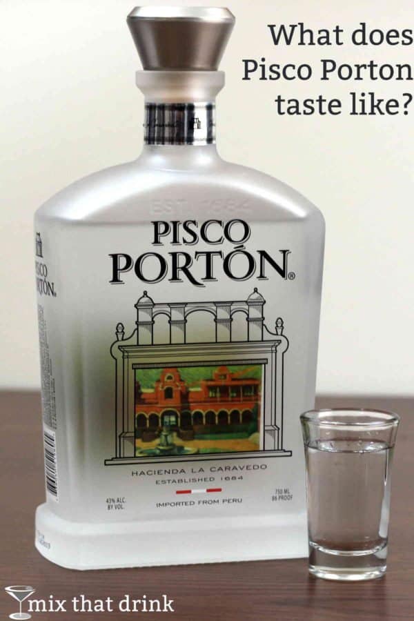 Bottle of Pisco Portin next to shot glass of same