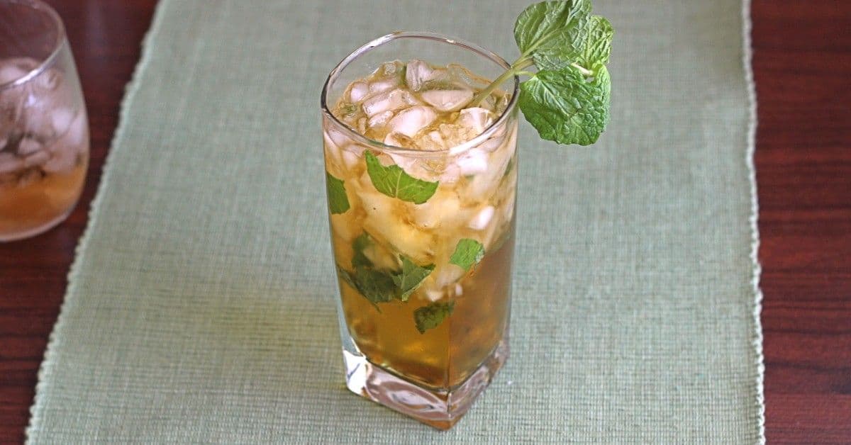 Queen's Park Swizzle drink with mint sprigs