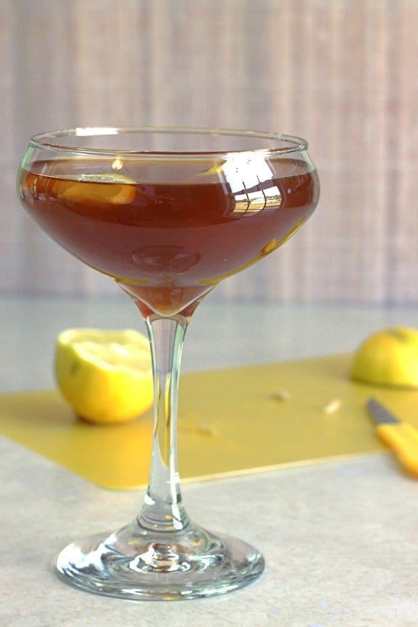 R.A.F. Cocktail with lemons on cutting board