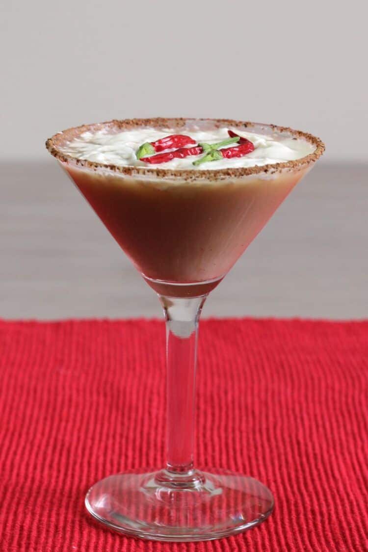 Red Hot Santa Tini with whipped cream and a chili powder cocoa rim