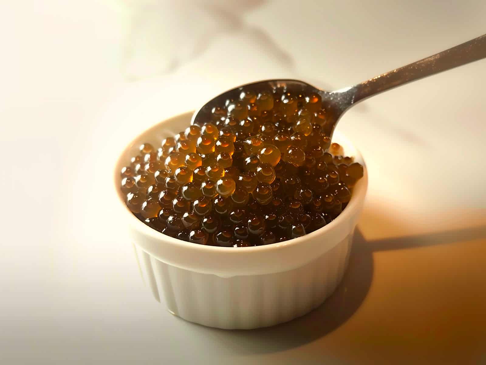 Rum Caviar in bowl with spoon