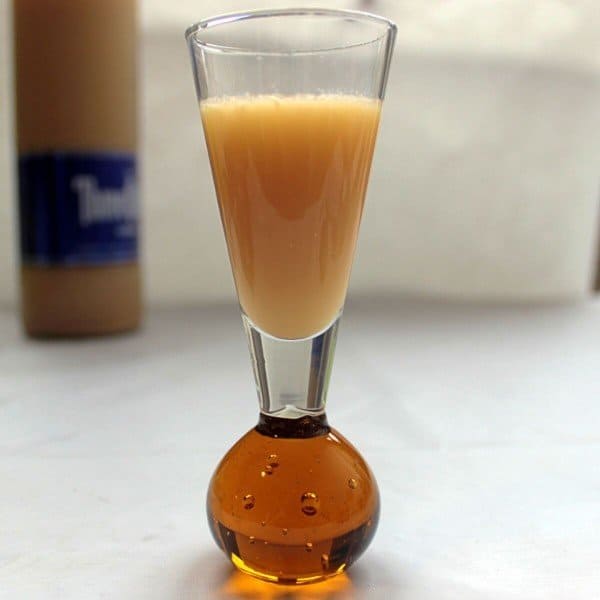 Salted Caramel vodka in a shot glass