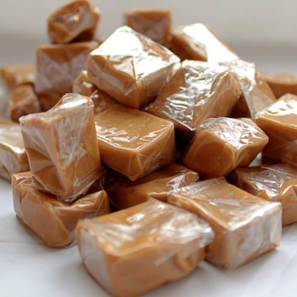 Caramel candies in plastic wrappers