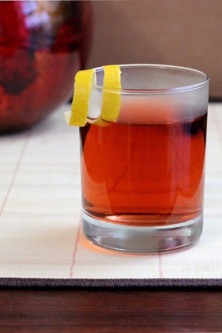 Sazerac cocktail with lemon twist