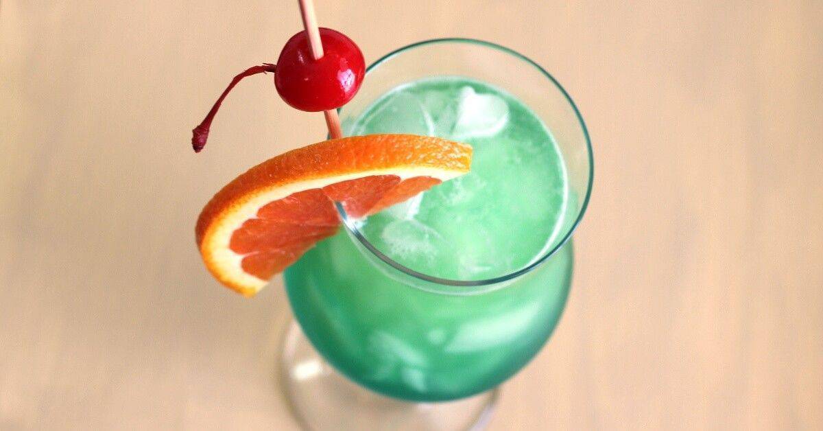 Shamrock Juice cocktail with cherry and orange