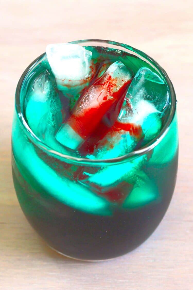 Shark Bite cocktail with grenadine floating like blood on top