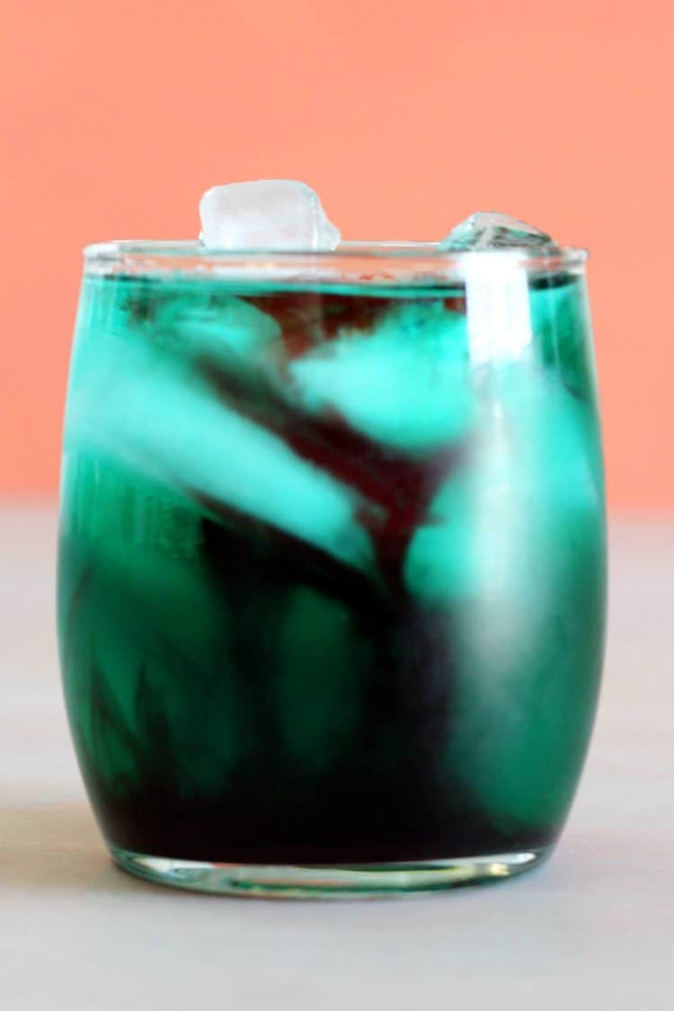 Shark Bite cocktail in rocks glass with ice