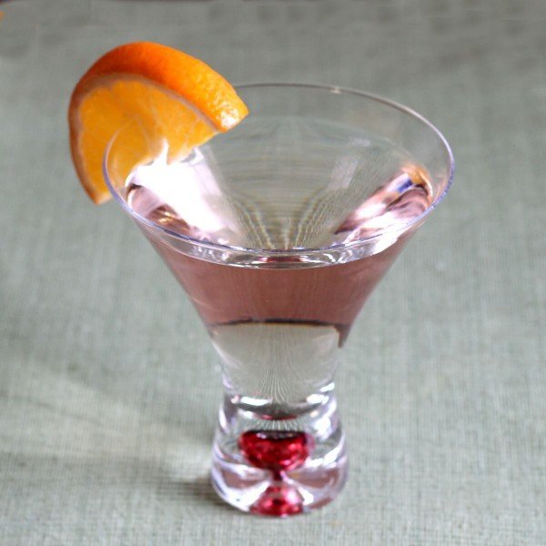 Clear Soho Martini in decorative glass with orange slice