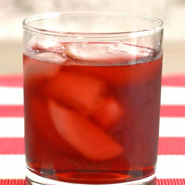 Spiced Watermelon Cooler drink on red and white tablecloth